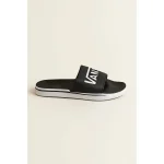 VANS OF THE WALL ALL BLACK WHITE LOGO SLIDE